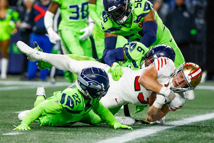 McCaffrey rushed for 114 yards and two touchdowns in the first half for the 49ers during their Thanksgiving game.